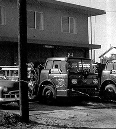 Black and white photo of an old fire truck